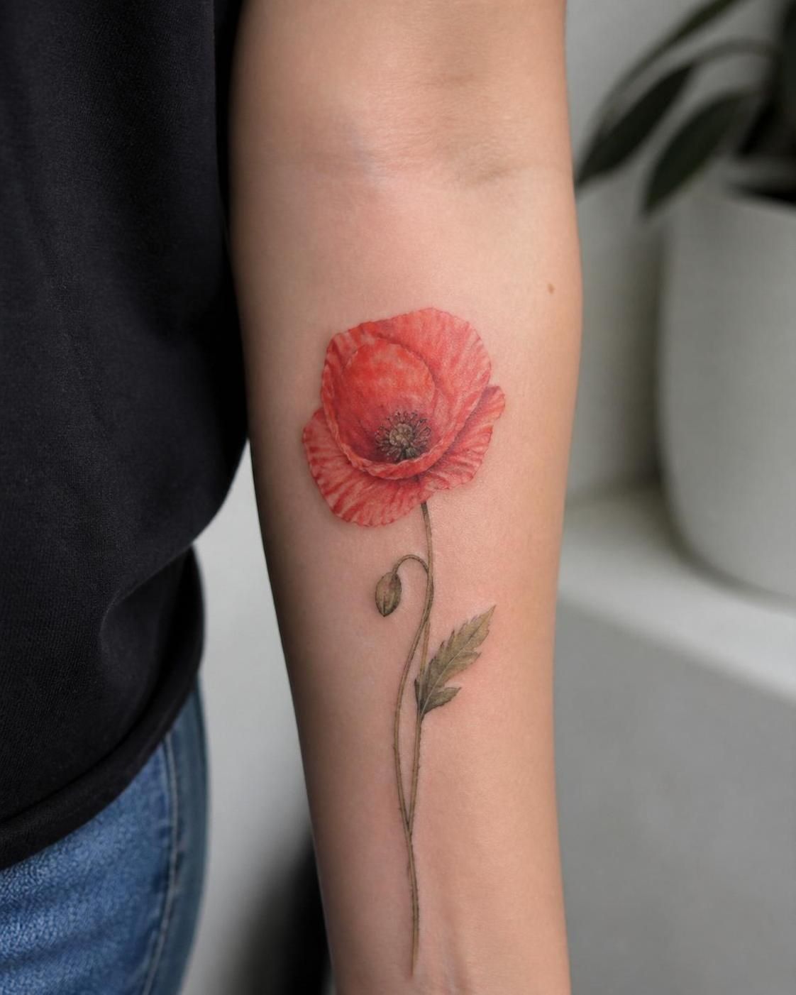 découvrez la symbolique profonde du tatouage coquelicot, son histoire et la signification unique de ce motif floral chargé d'émotions et de souvenirs.